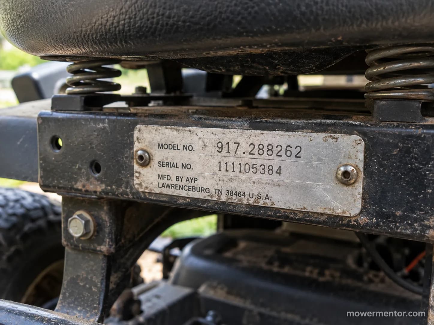 Craftsman riding mower model plate showing a 917 prefix under the seat.