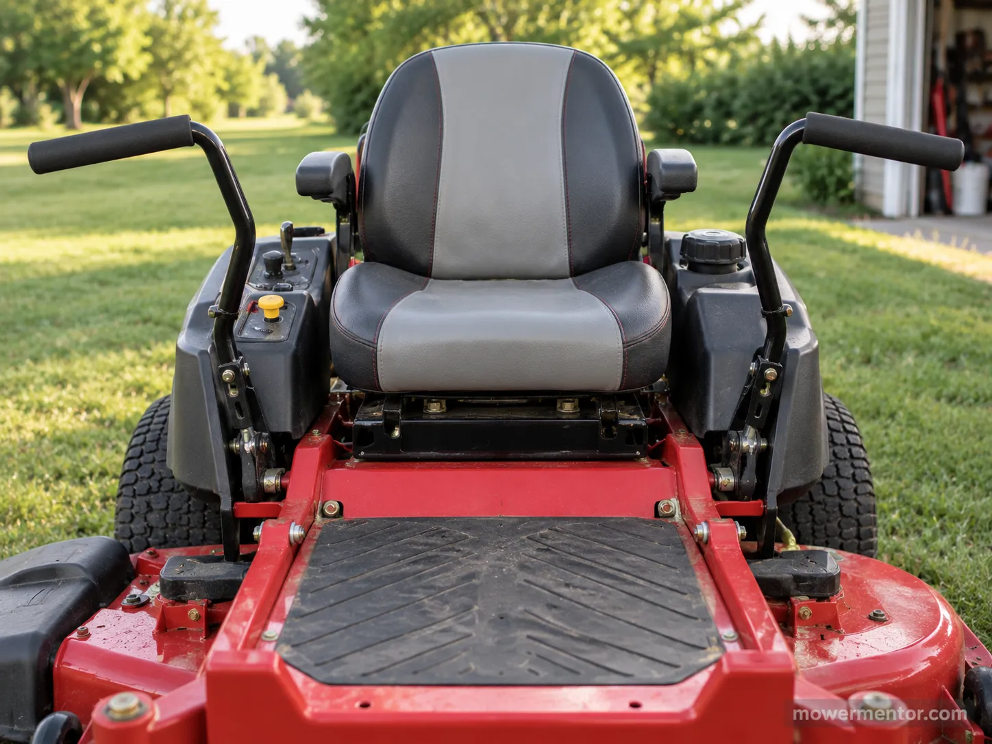 Cub Cadet zero-turn lap bars in the neutral position that allows starting.