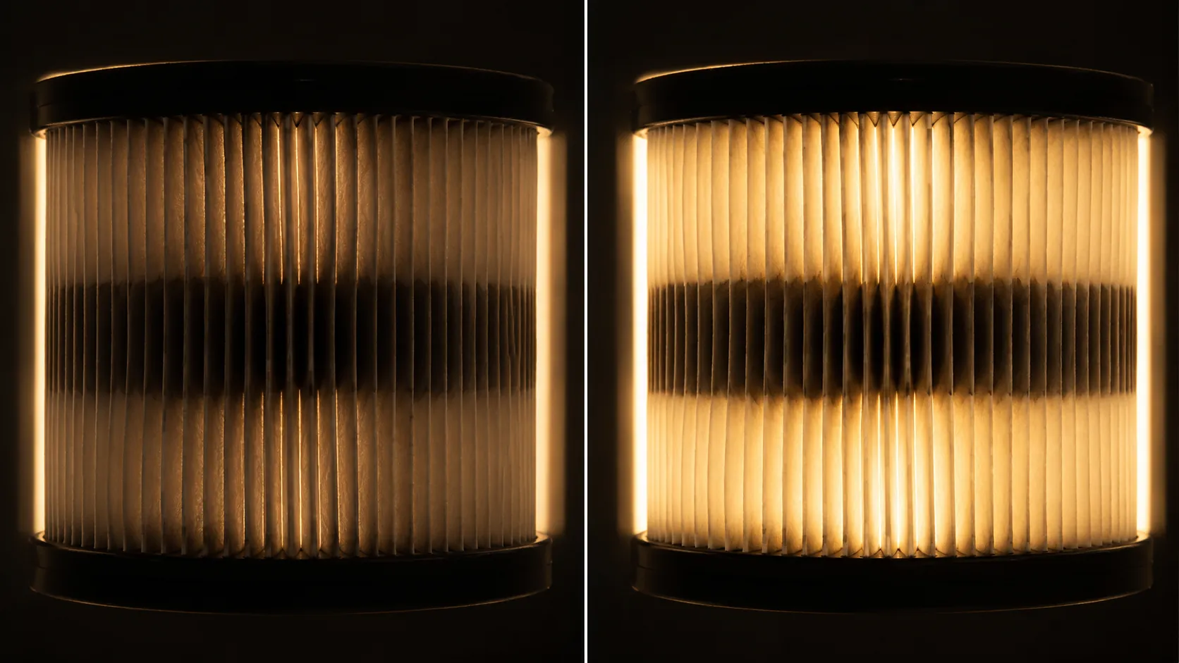 Side-by-side backlit lawn mower paper air filter cartridge before and after tapping, showing light passing through the cleaned outer pleats while the clogged center band remains dark.