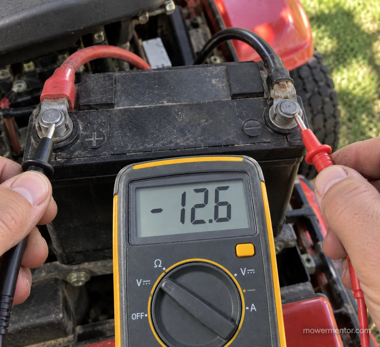 multimeter showing a negative voltage reading from a reversed lawn mower battery