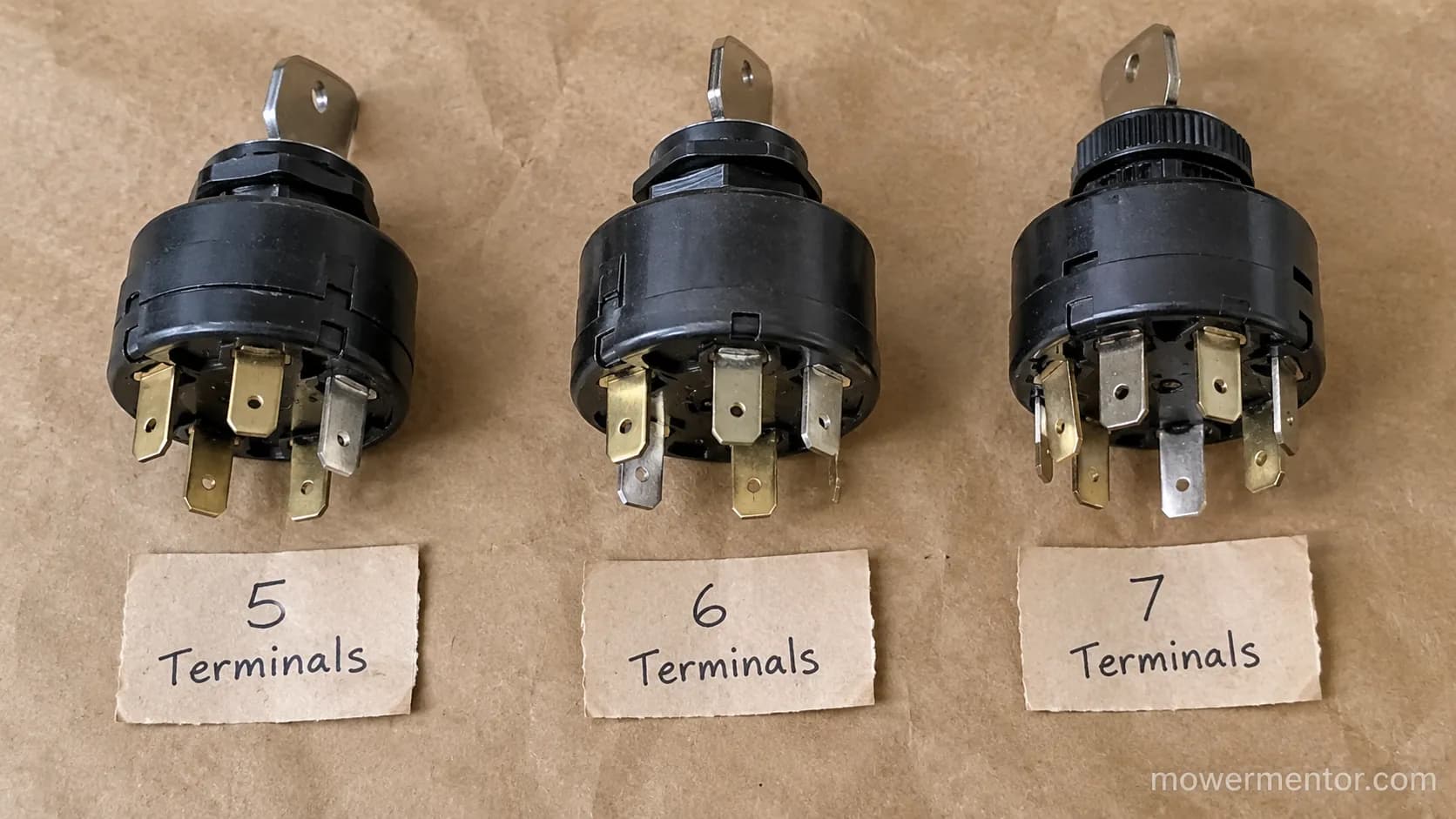 Five-terminal, six-terminal, and seven-terminal mower ignition switches compared side by side.