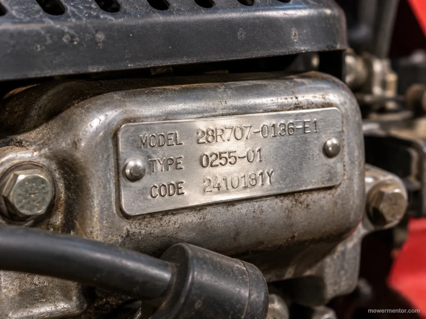 Briggs and Stratton engine model tag on a Murray riding mower used for starter fitment