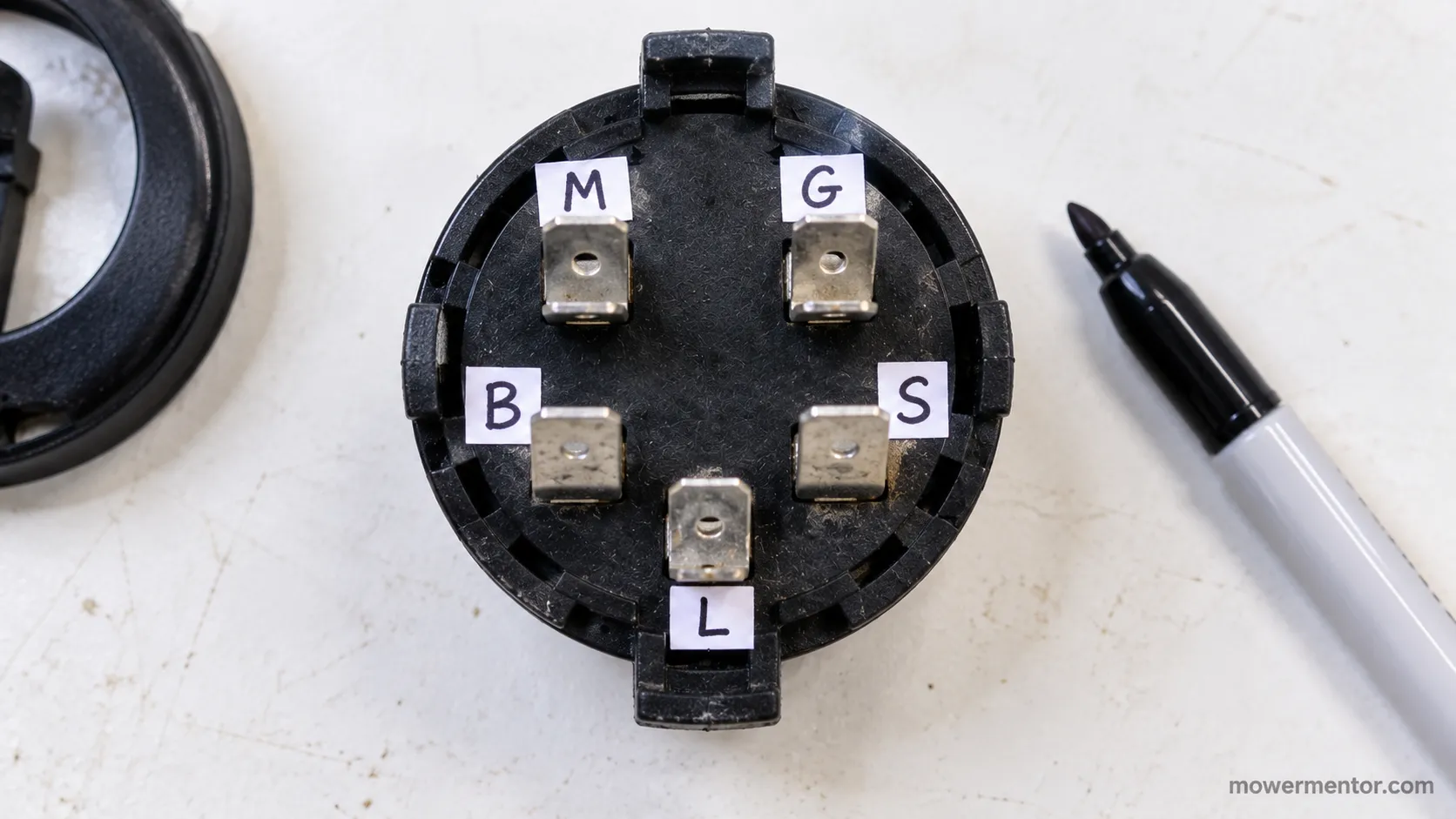 Back of a Murray 5-post ignition switch with the B S L M G terminals labeled