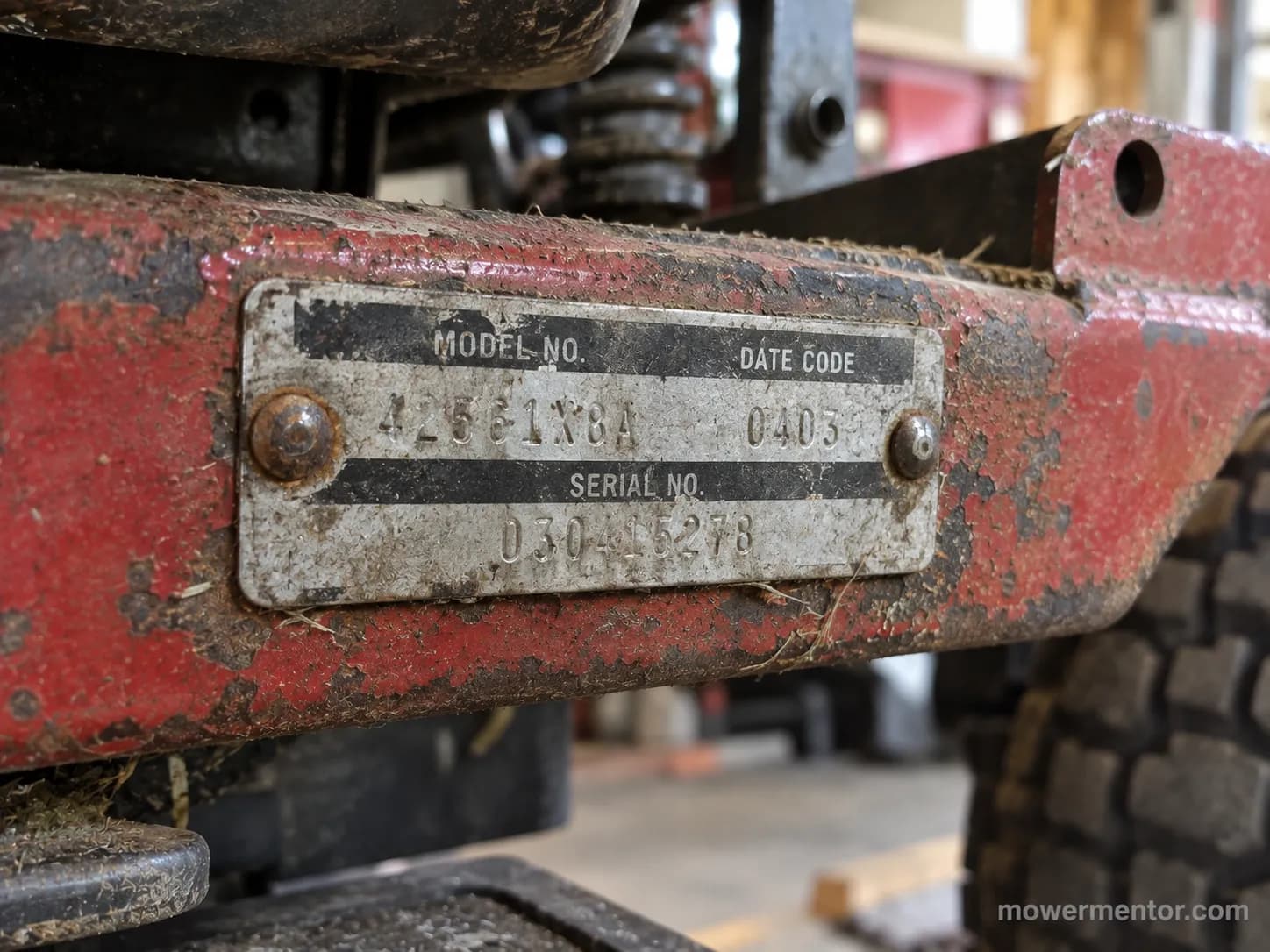 Weathered pre-2005 model and date plate on a discontinued Murray riding mower.